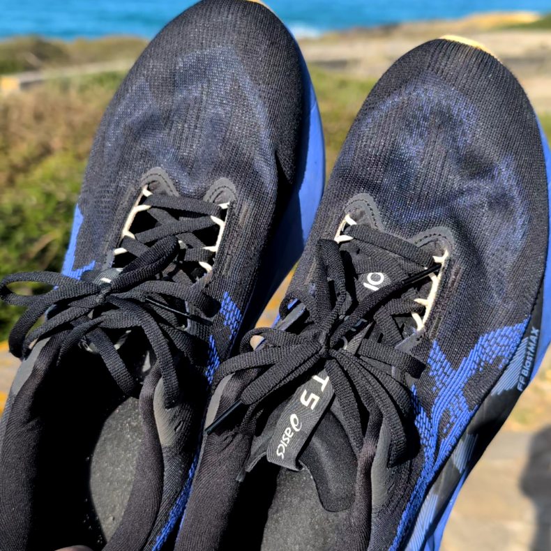 Asics running shoes by the sea, shot by Ian Thistleton